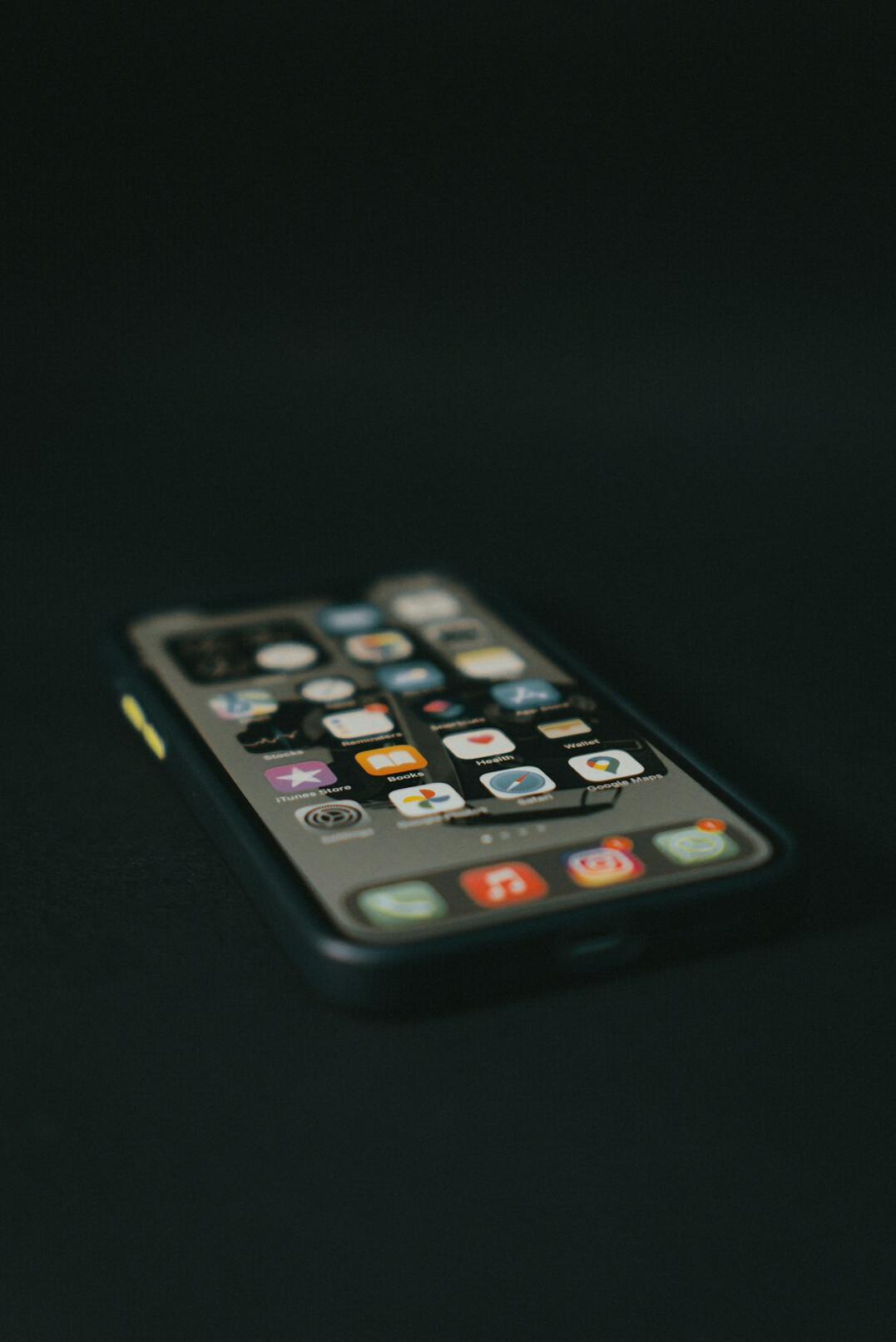 Smartphone with social media icons on a screen